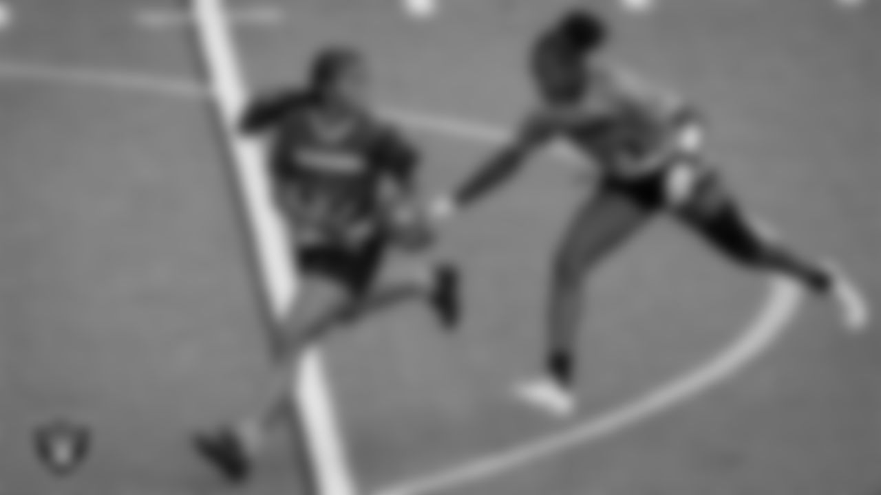 Athletes compete during a girls division Silver and Black League playoff game at Western High School.