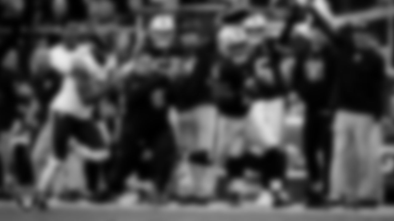 Las Vegas Raiders running back Ashton Jeanty (2) rushes for a 64-yard touchdown during the regular season home game against the Chicago Bears at Allegiant Stadium.