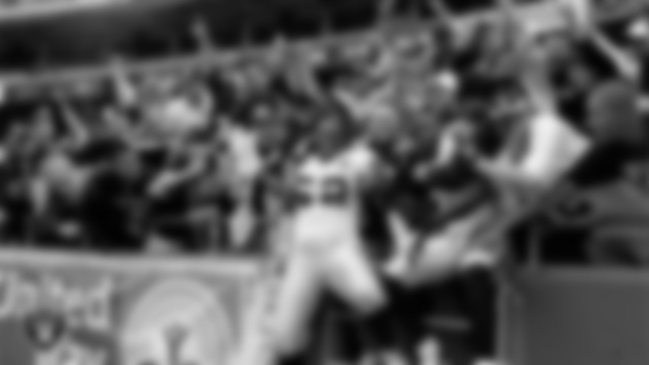 Oakland Raiders linebacker Kirk Morrison (52) with fans after the regular season away game against the Kansas City Chiefs at Arrowhead Stadium, Monday, September 14, 2008, in Kansas City, Mo.