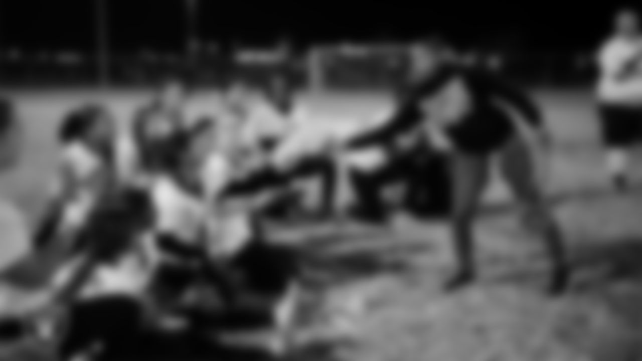 Las Vegas Raiders manager of football development Marli Bartlett presents the championship belt to the SLAM! Nevada flag football team after the Raiders' High School Flag Football Showcase game at Russel Road Recreational Complex.