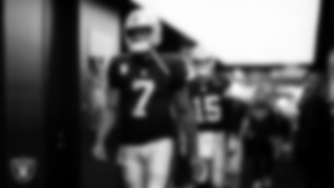 Las Vegas Raiders quarterback Geno Smith (7) walks down the tunnel before the regular season home game against the Dallas Cowboys at Allegiant Stadium.
