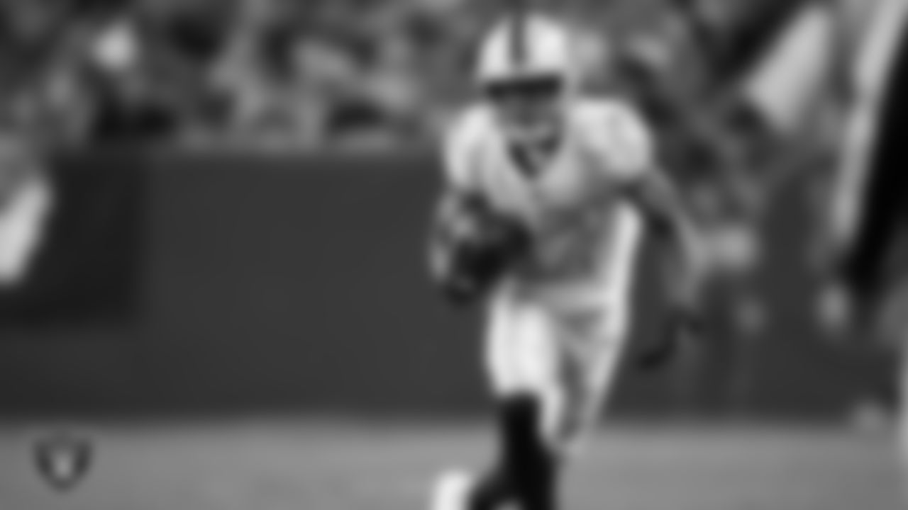 Las Vegas Raiders wide receiver Tyler Lockett (17) runs after making a catch during the regular season away game against the Denver Broncos at Empower Field at Mile High.