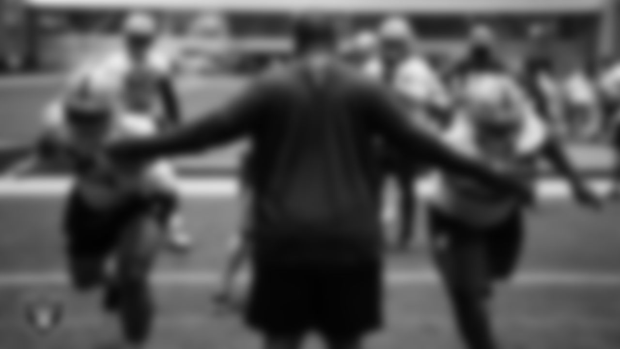 Las Vegas Raiders defensive tackle Leki Fotu (95) and defensive tackle JJ Pegues (92) during practice at Intermountain Health Performance Center.