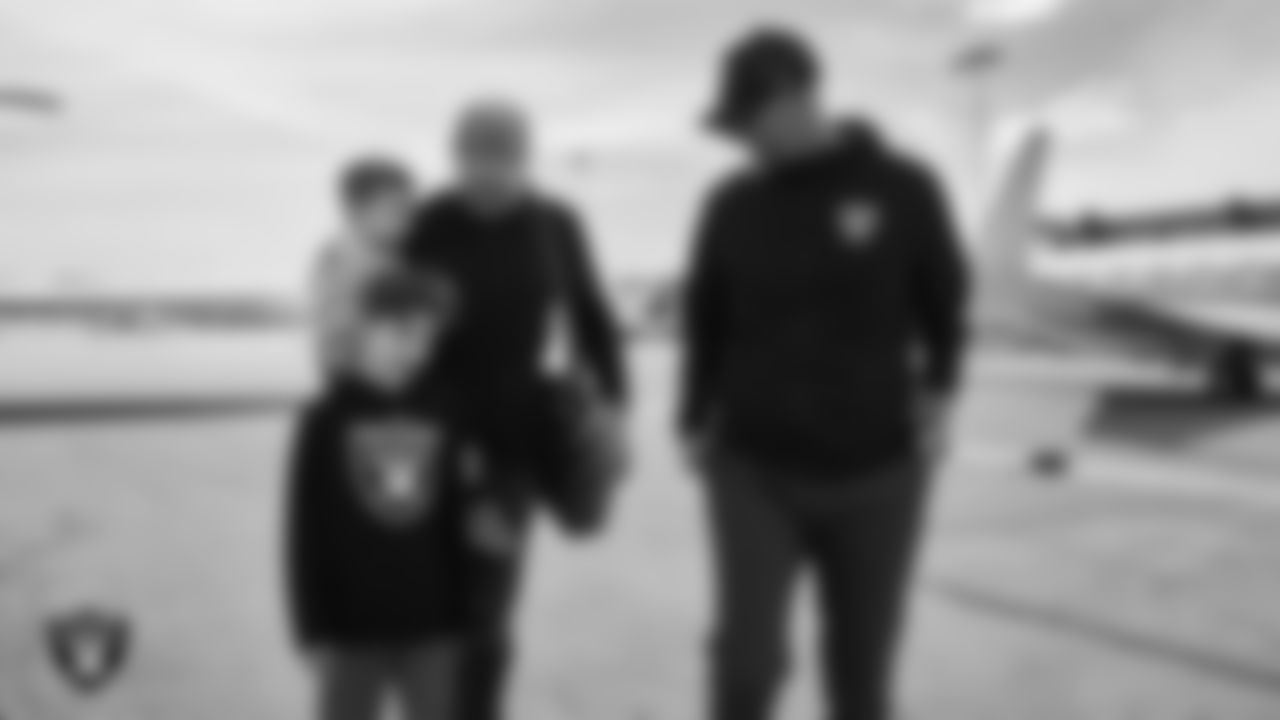Las Vegas Raiders General Manager John Spytek greets Head Coach Klint Kubiak as he and his family arrive in Henderson.