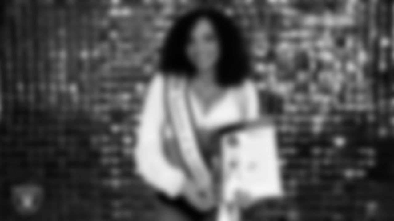 Raiderette Makenna is named Raiderette of the Game in the locker room before the regular season home game against the Cleveland Browns at Allegiant Stadium.