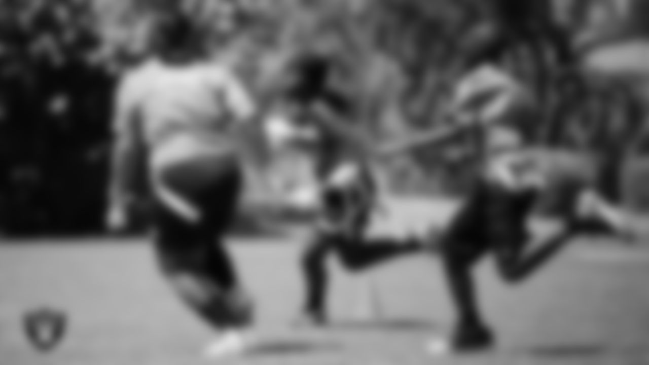 Athletes compete in a Silver and Black Flag Football game at Bill and Lillie Heinrich YMCA.