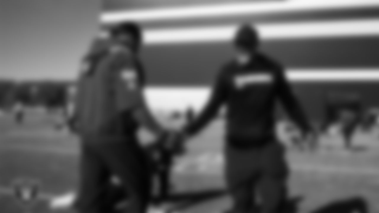 Las Vegas Raiders linebacker Jamal Adams (33) and defensive backs coach Marcus Robertson during practice at Intermountain Health Performance Center.