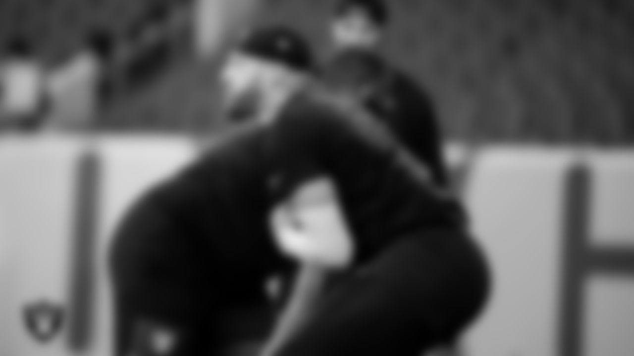 Las Vegas Raiders defensive end Maxx Crosby (98) warming up before the regular season away game against the Denver Broncos at Empower Field at Mile High.