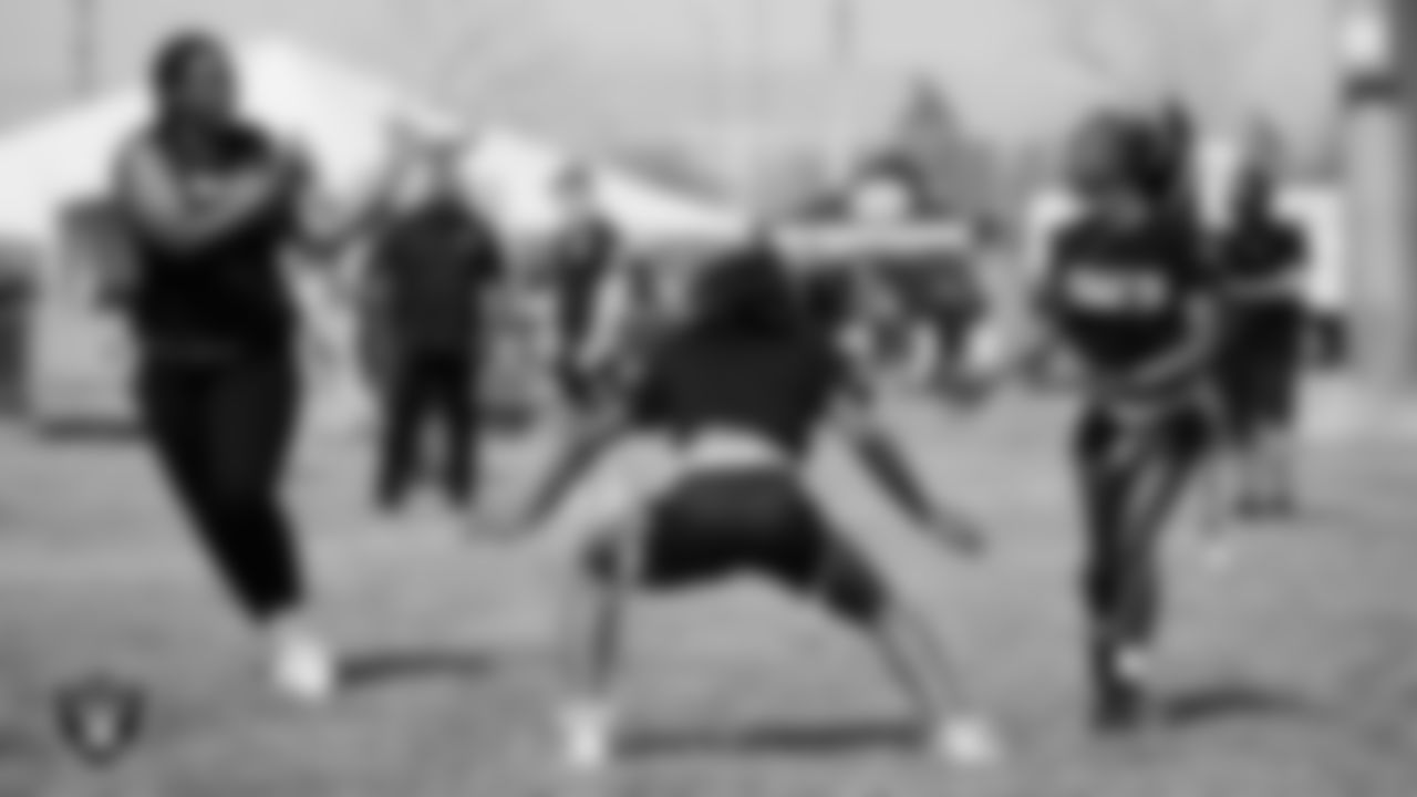 Athletes take part in a rugby drill during the NRL Gala Day flag football tournament at Silver Bowl Park.