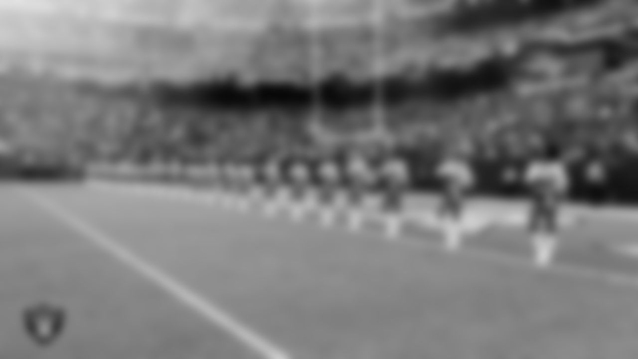 The Raiderettes during the national anthem before the preseason home game against the San Francisco 49ers at Allegiant Stadium.
