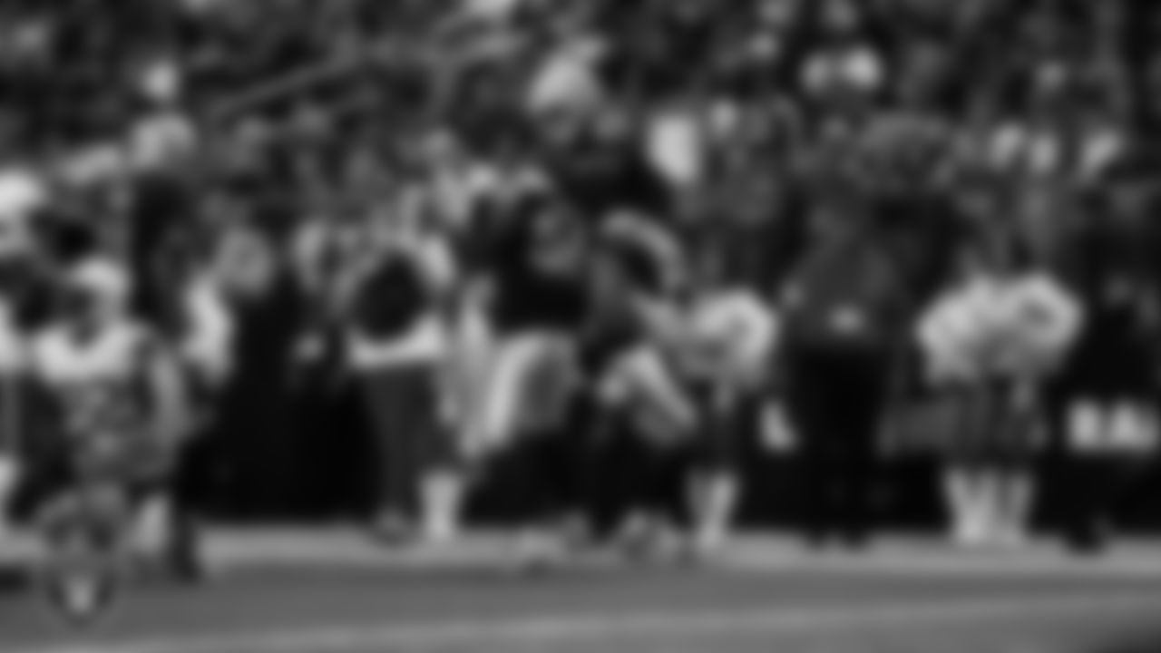 Las Vegas Raiders linebacker Elandon Roberts (52) celebrates with linebacker Devin White (45) after making a tackle during the regular season home game against the Cleveland Browns at Allegiant Stadium.