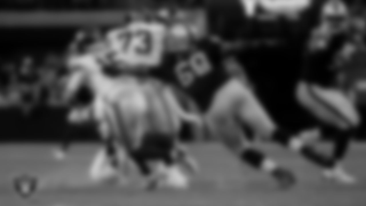 Las Vegas Raiders defensive lineman Adam Butler (69) pressures the quarterback during the regular season home game against the New York Giants at Allegiant Stadium.