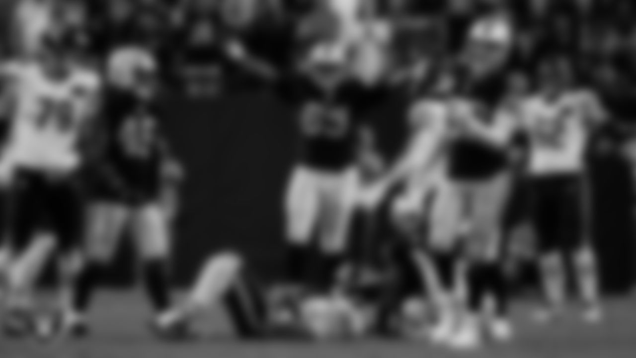 Las Vegas Raiders defensive tackle Adam Butler (69) celebrates on the field during the regular season home game against the Chicago Bears at Allegiant Stadium.