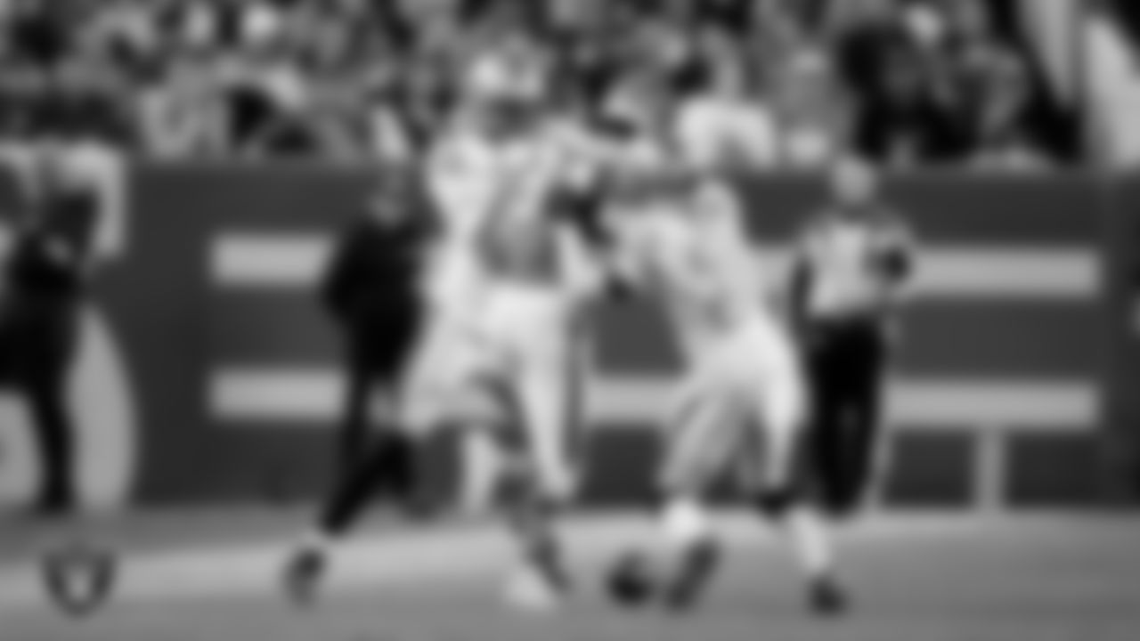 Las Vegas Raiders safety Lonnie Johnson Jr. (32) and cornerback Darnay Holmes (30) during the regular season away game against the Denver Broncos at Empower Field at Mile High.