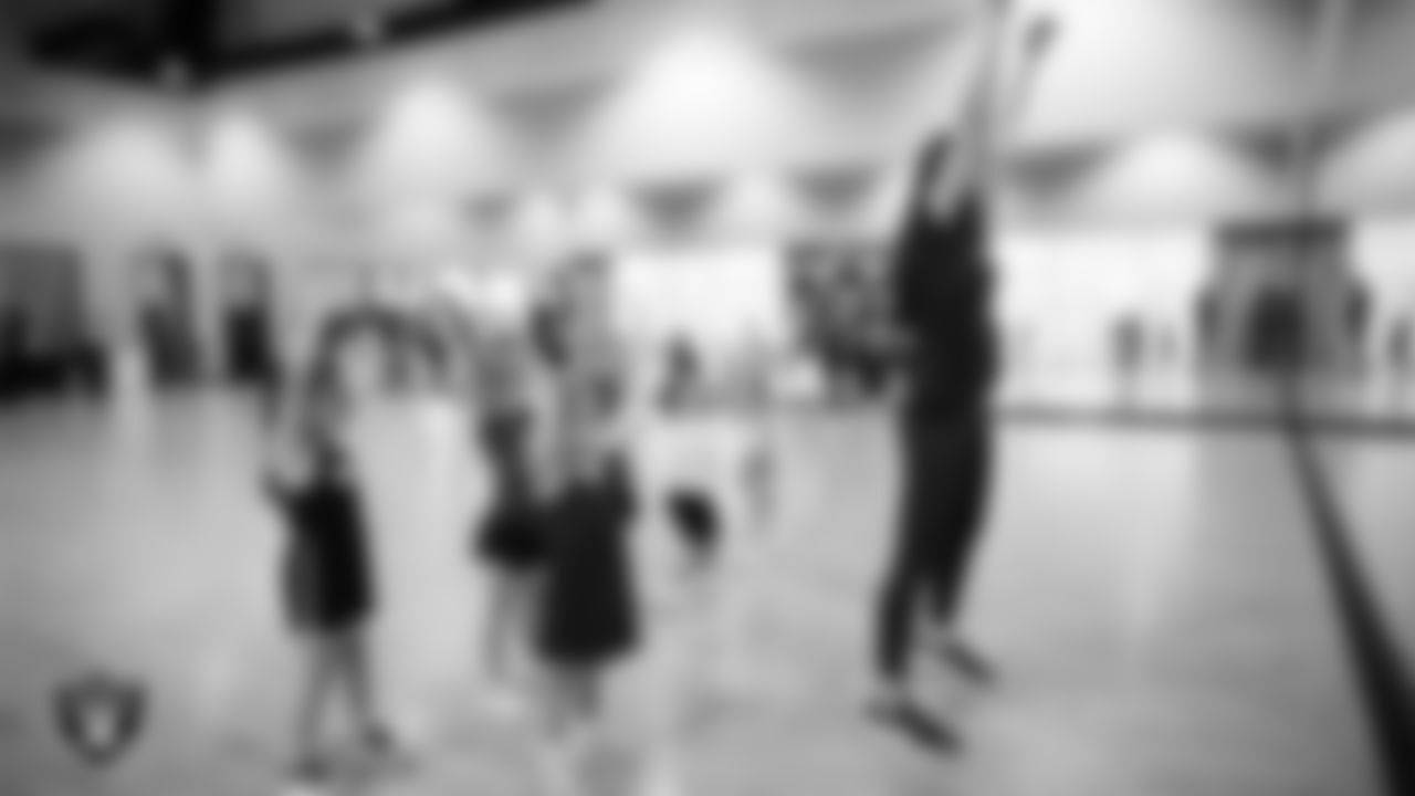 Raiderette Meekela with dancers during day one of summer camp at The Studio.