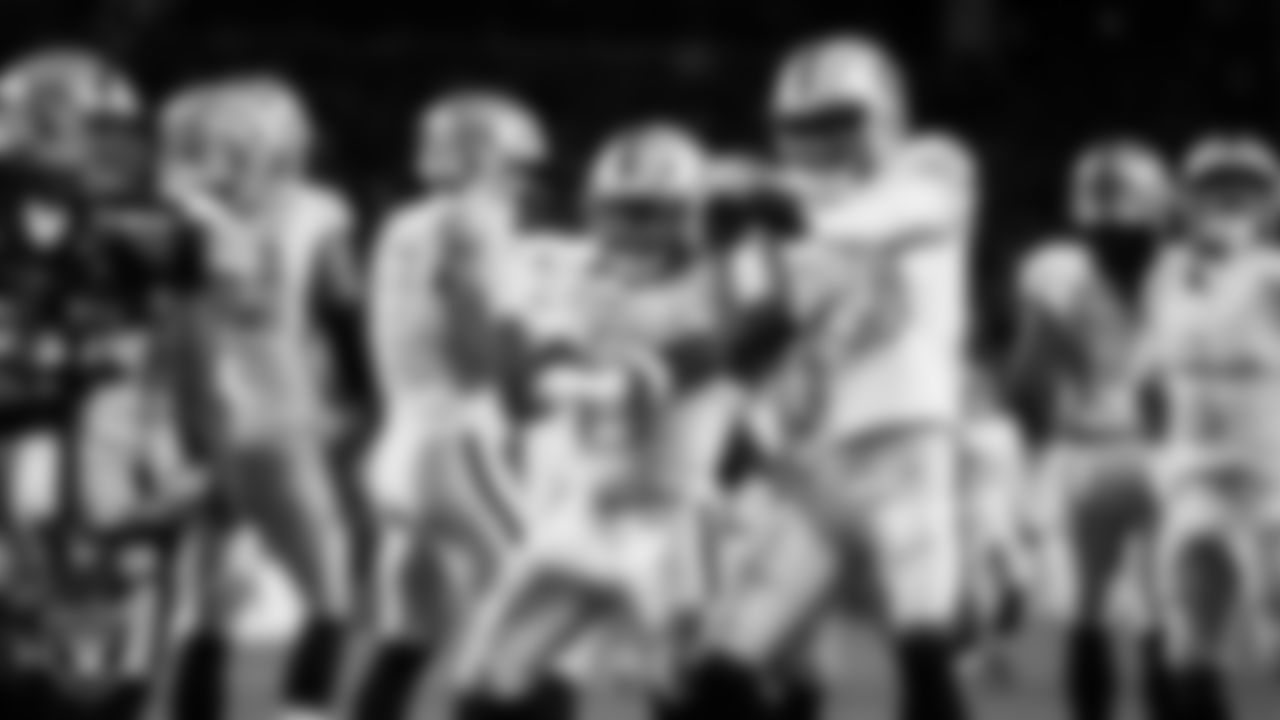 Las Vegas Raiders running back Ashton Jeanty (2) celebrates with wide receiver Dont'e Thornton Jr. (10) after rushing for a 4-yard touchdown during the regular season away game against the Denver Broncos at Empower Field at Mile High.