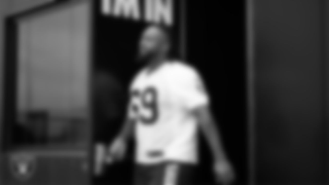 Las Vegas Raiders defensive tackle Adam Butler (69) walks out to the field for practice at Intermountain Health Performance Center.