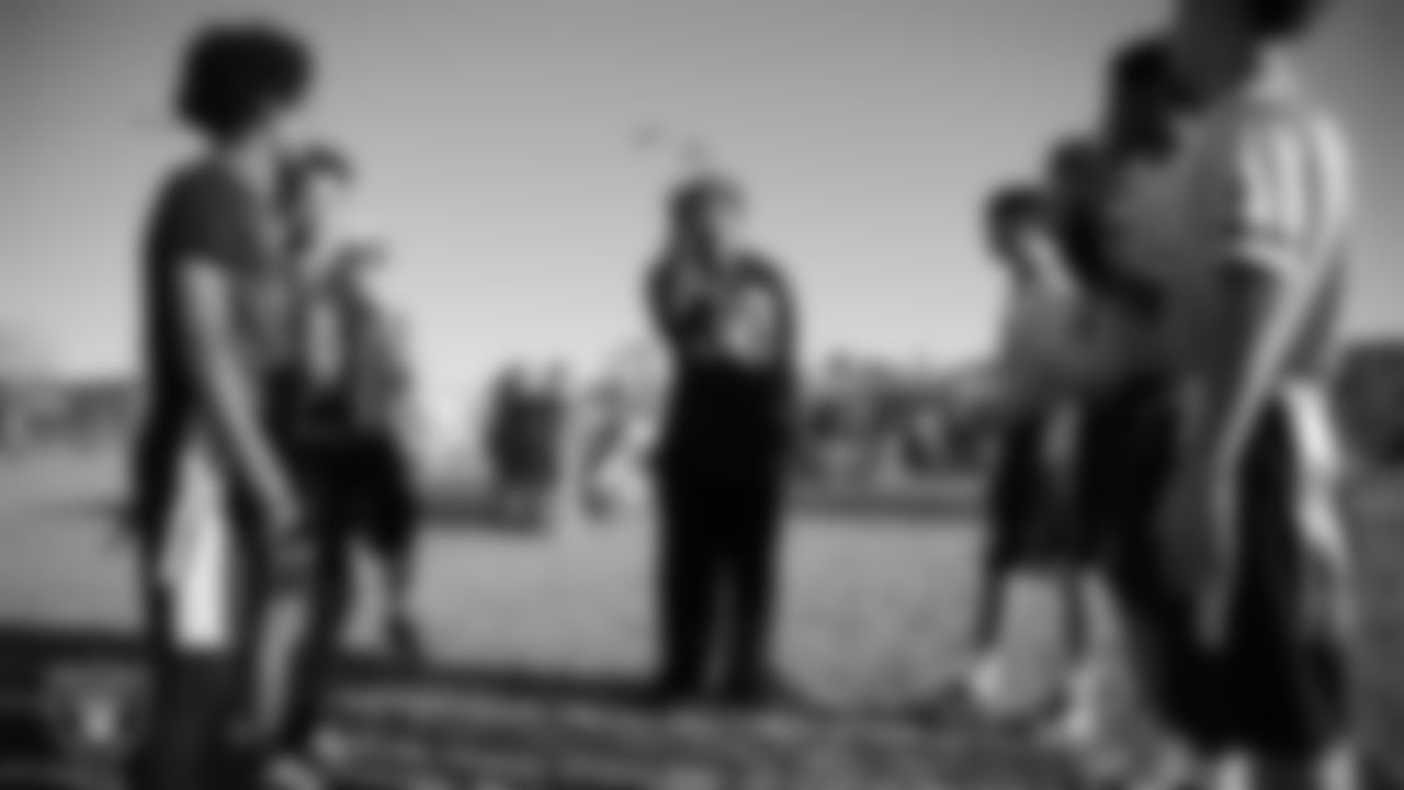 Las Vegas Raiders cornerback Darnay Holmes (30) during the coin toss before the Las Vegas Raiders' Middle School Flag Football Showcase game at Charles Silvestri Junior High School.