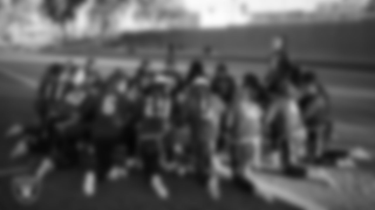 The Desert Oasis High School flag football team huddles before the Las Vegas Raiders' Flag Football Showcase game against Liberty High School at Desert Oasis High School.