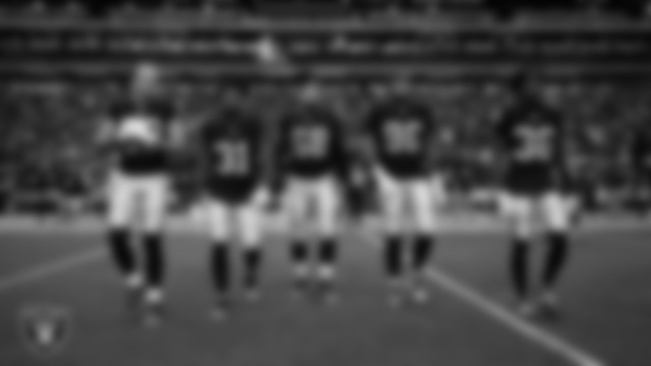 Las Vegas Raiders tight end Brock Bowers (89), running back Raheem Mostert (31), defensive tackle Treven Ma'ae (68), defensive tackle Jonah Laulu (96) and cornerback Kyu Blu Kelly (36) walk out to the center of the field for the coin toss before the preseason home game against the the San Francisco 49ers at Allegiant Stadium.