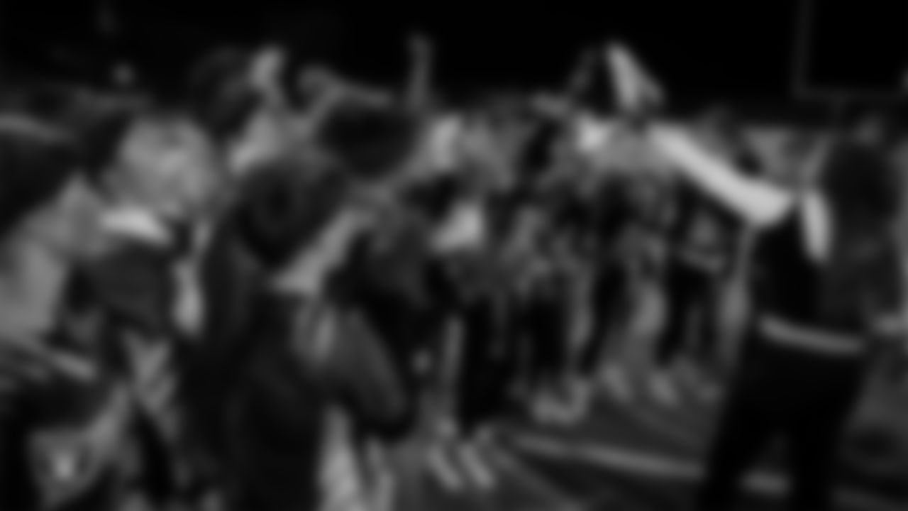 Las Vegas Raiders manager of football development Marli Bartlett presents the championship belt to the Sierra Vista High School flag football team after the Raiders' High School Flag Football Showcase game at Sierra Vista High School.