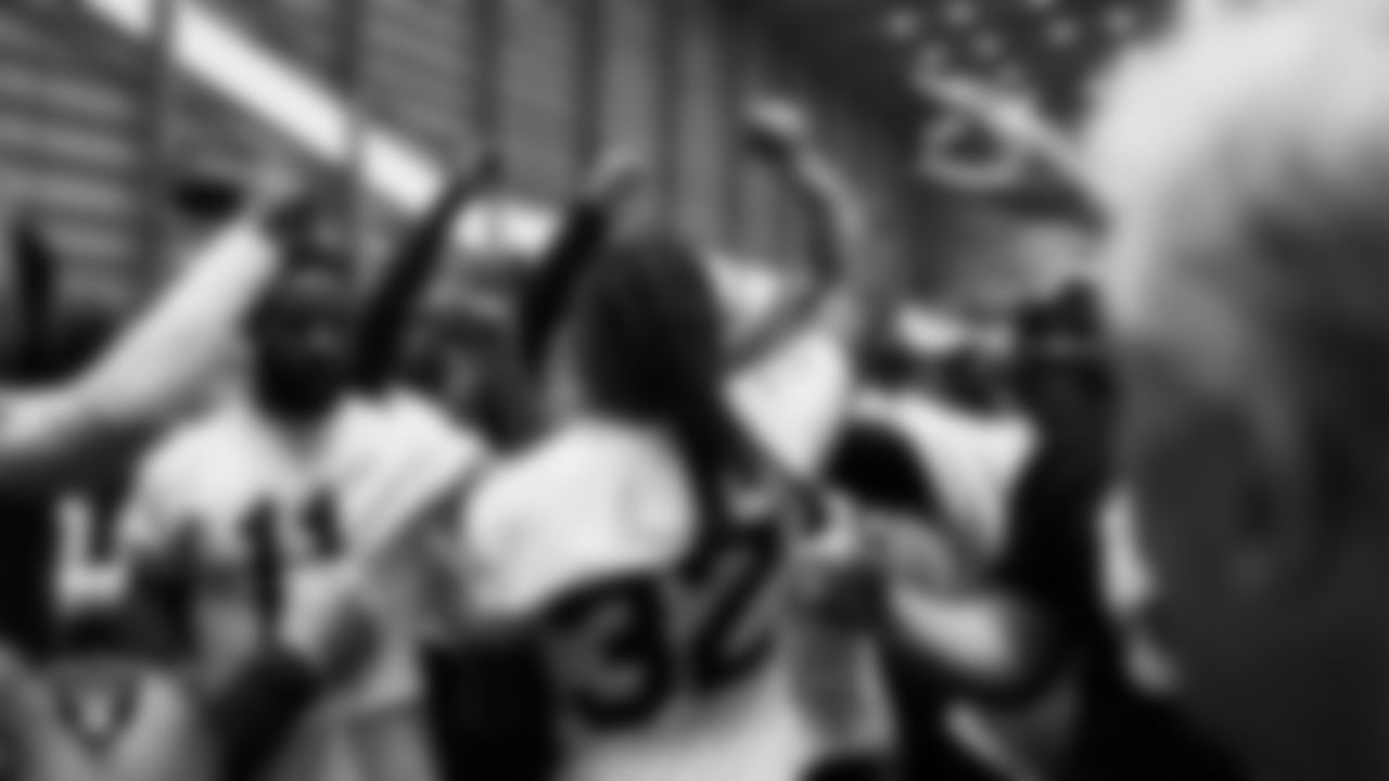 The Las Vegas Raiders huddle during practice at Intermountain Health Performance Center.