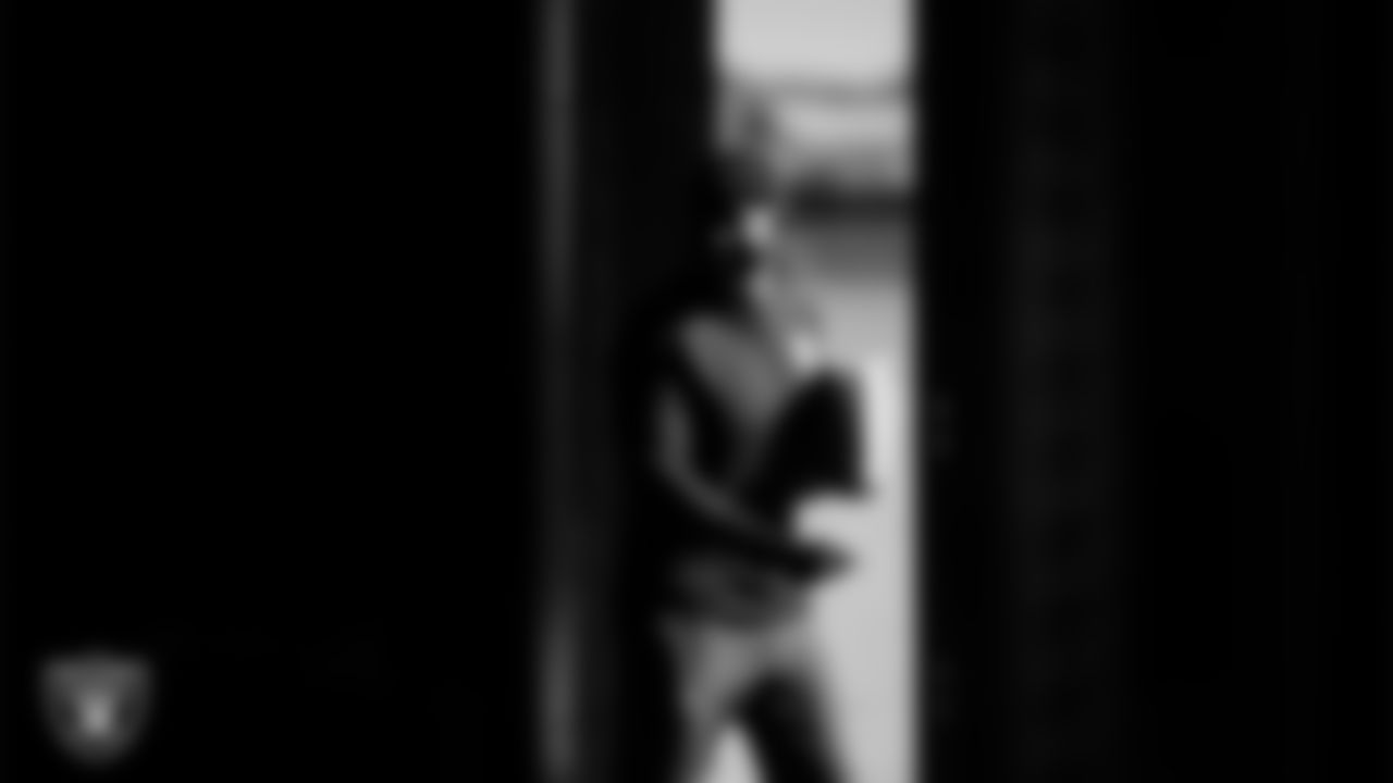 Las Vegas Raiders defensive quality control coach Beyah Rasool walks out to the field for practice at Intermountain Health Performance Center.