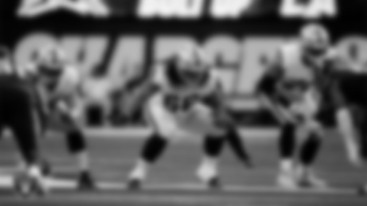 Las Vegas Raiders guard Alex Cappa (65), guard Dylan Parham (66) and offensive lineman Stone Forsythe (70) line up before the snap during the regular season away game against the Los Angeles Chargers at SoFi Stadium.