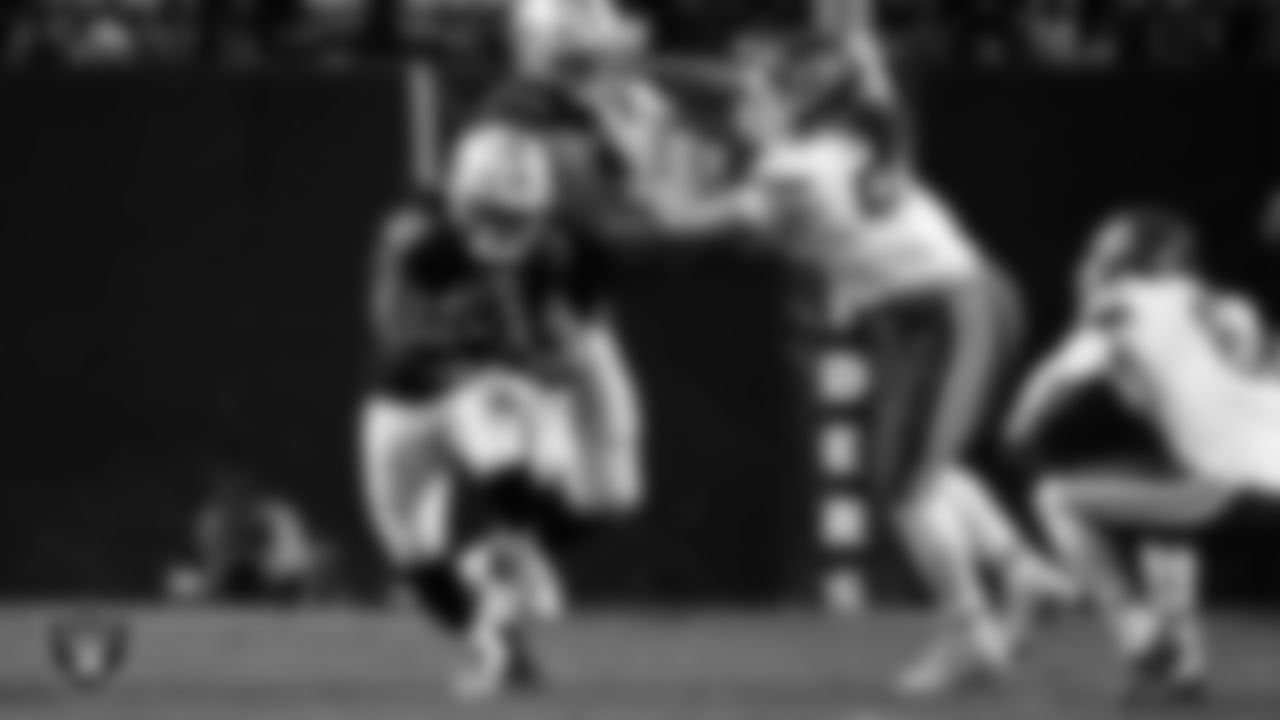 Las Vegas Raiders running back Ashton Jeanty (2) rushes during the regular season home game against the Kansas City Chiefs at Allegiant Stadium.