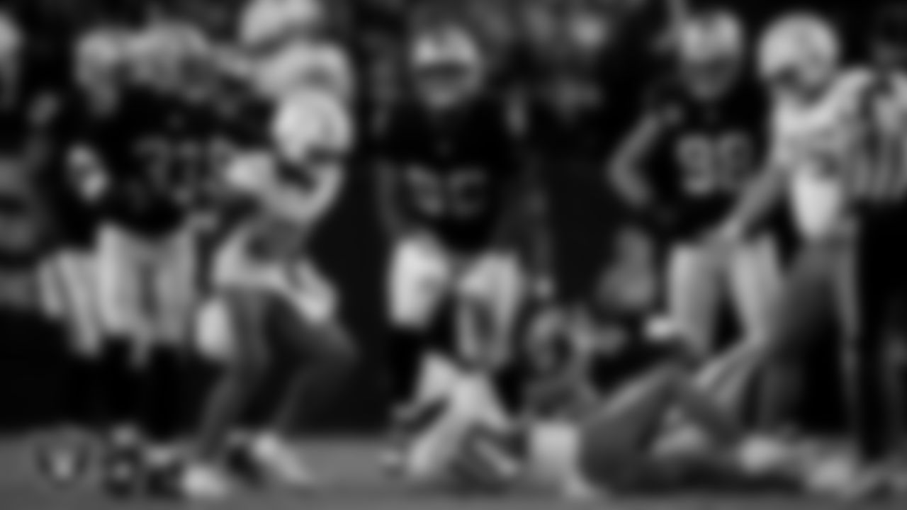 Las Vegas Raiders defensive tackle Jonah Laulu (96) celebrates after sacking the quarterback during the regular season home game against the Los Angeles Chargers at Allegiant Stadium.