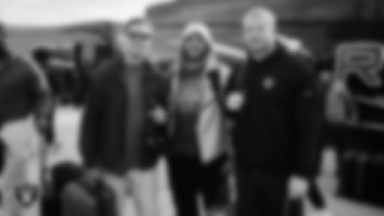 Las Vegas Raiders linebackers coach John Glenn and linebackers Jon Rhattigan (59) and Tommy Eichenberg (44) depart for the regular season away game against the Denver Broncos.