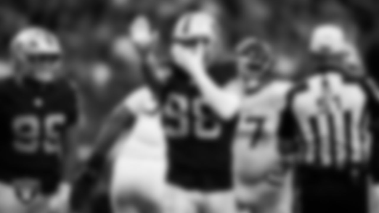 Las Vegas Raiders defensive end Maxx Crosby (98) celebrates after sacking the quarterback during the regular season home game against the Tennessee Titans at Allegiant Stadium.