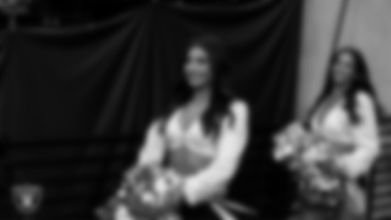 Raiderette Maddie walks through the tunnel before the regular season home game against the Denver Broncos at Allegiant Stadium.