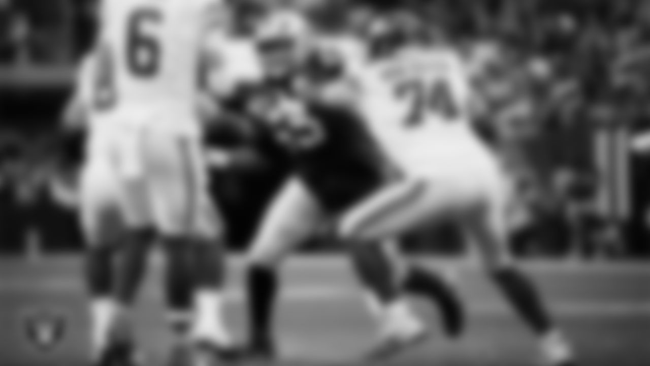 Las Vegas Raiders defensive tackle Adam Butler (69) pressures the quarterback during the regular season home game against the New York Giants at Allegiant Stadium.