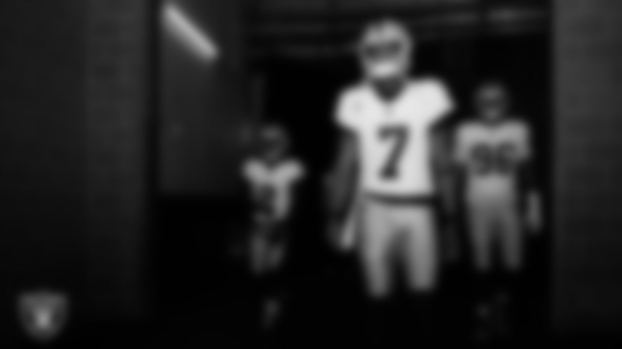 Las Vegas Raiders quarterback Geno Smith (7) walks down the tunnel before the regular season away game against the Houston Texans at NRG Stadium.