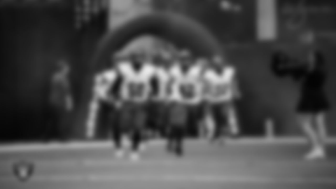 The Pershing County High School football team takes the field before the NIAA 2A Division State Championship game against Needles High School at Allegiant Stadium.