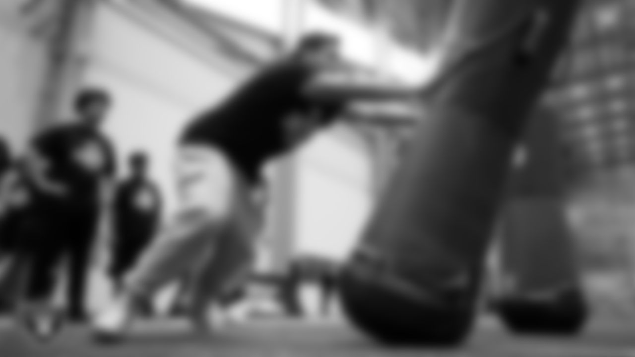 An athlete works through a drill during Raiders ELITE Academy at Las Vegas Raiders Headquarters.