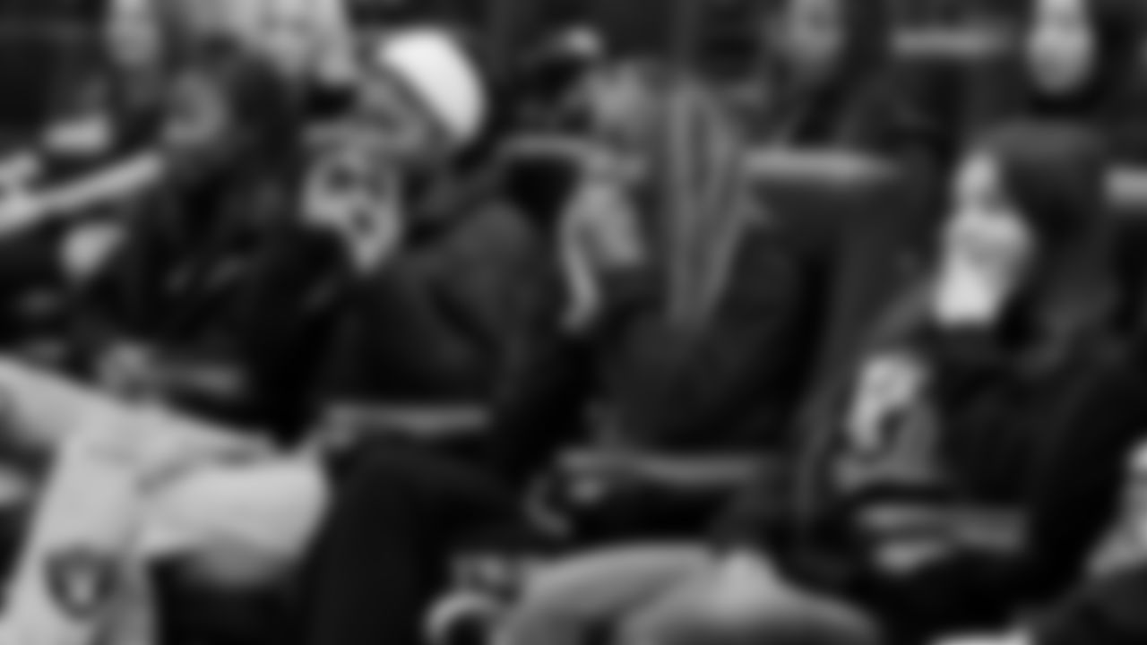 Athletes from Clark High School and Chaparral High School react after being told they are getting all new flag football uniforms and equipment at Intermountain Health Performance Center.