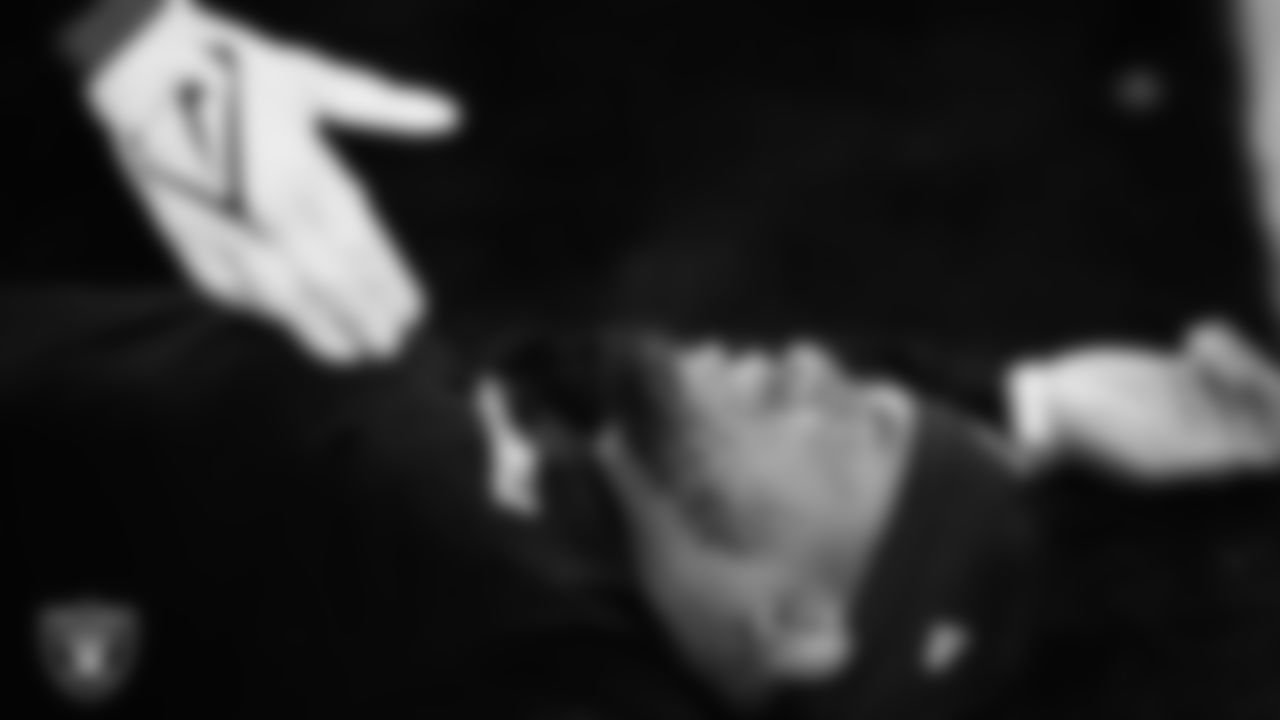 Las Vegas Raiders defensive tackle Jonah Laulu (96) warming up before the regular season home game against the Dallas Cowboys at Allegiant Stadium.