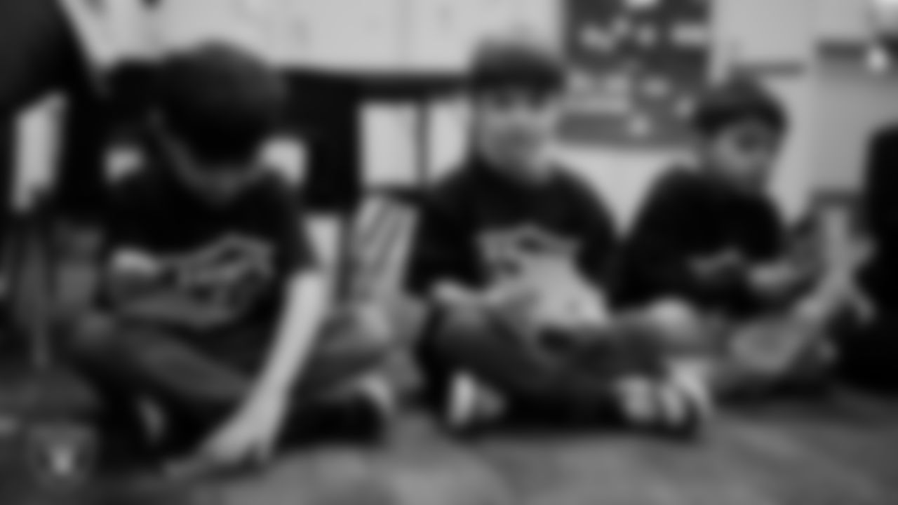 Students celebrate winning the Lil' Raiders School Challenge at Richard H. Bryan Elementary School.