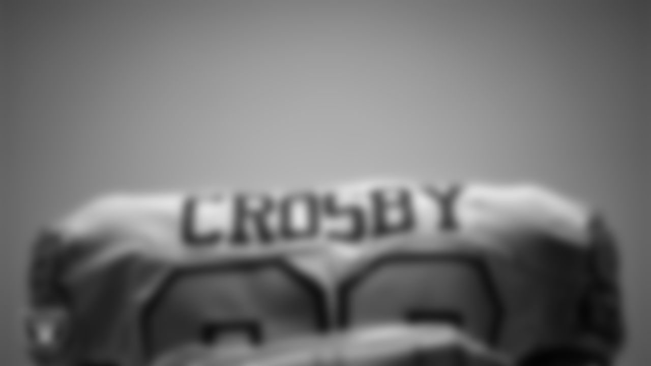 Las Vegas Raiders defensive end Maxx Crosby's (98) pads in the locker room prior to the Raiders' arrival for their regular season away game against the Denver Broncos at Empower Field at Mile High.