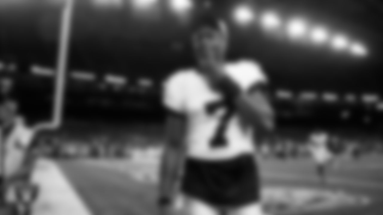 Las Vegas Raiders quarterback Geno Smith (7) exits the field after the preseason away game against the Seattle Seahawks at Lumen Field.