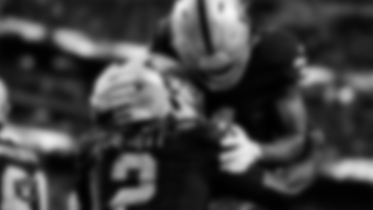 Las Vegas Raiders running back Ashton Jeanty (2) celebrates with running back Raheem Mostert (31) after making a 15-yard touchdown catch during the regular season home game against the Jacksonville Jaguars at Allegiant Stadium.