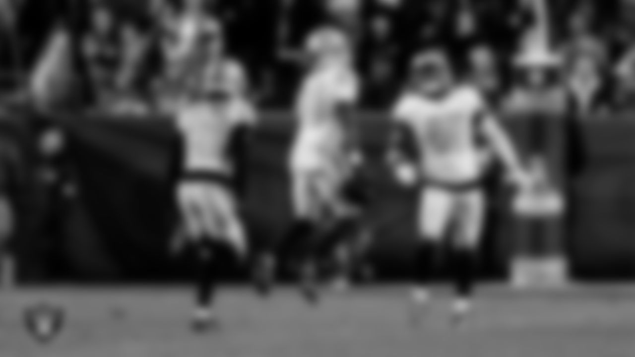 Las Vegas Raiders cornerback Kyu Blu Kelly (36) celebrates with teammates after intercepting a pass during the regular season away game against the Denver Broncos at Empower Field at Mile High.