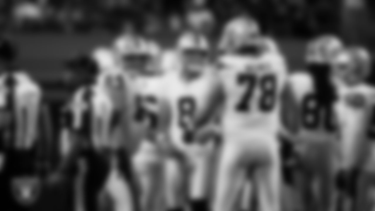 Las Vegas Raiders kicker Daniel Carlson (8) celebrates with teammates after kicking a 51-yard field goal during the preseason away game against the Seattle Seahawks at Lumen Field.