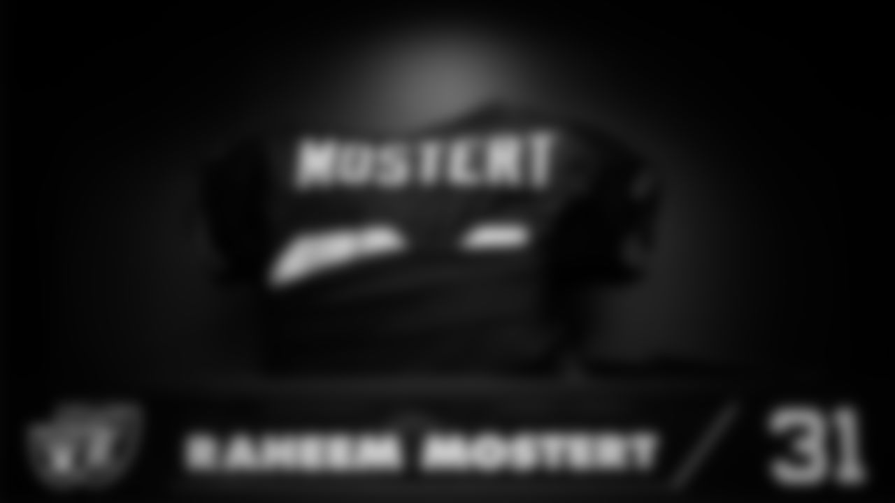 Las Vegas Raiders running back Raheem Mostert's (31) pads in the locker room prior to the Raiders' arrival for their regular season home game against the Jacksonville Jaguars at Allegiant Stadium.