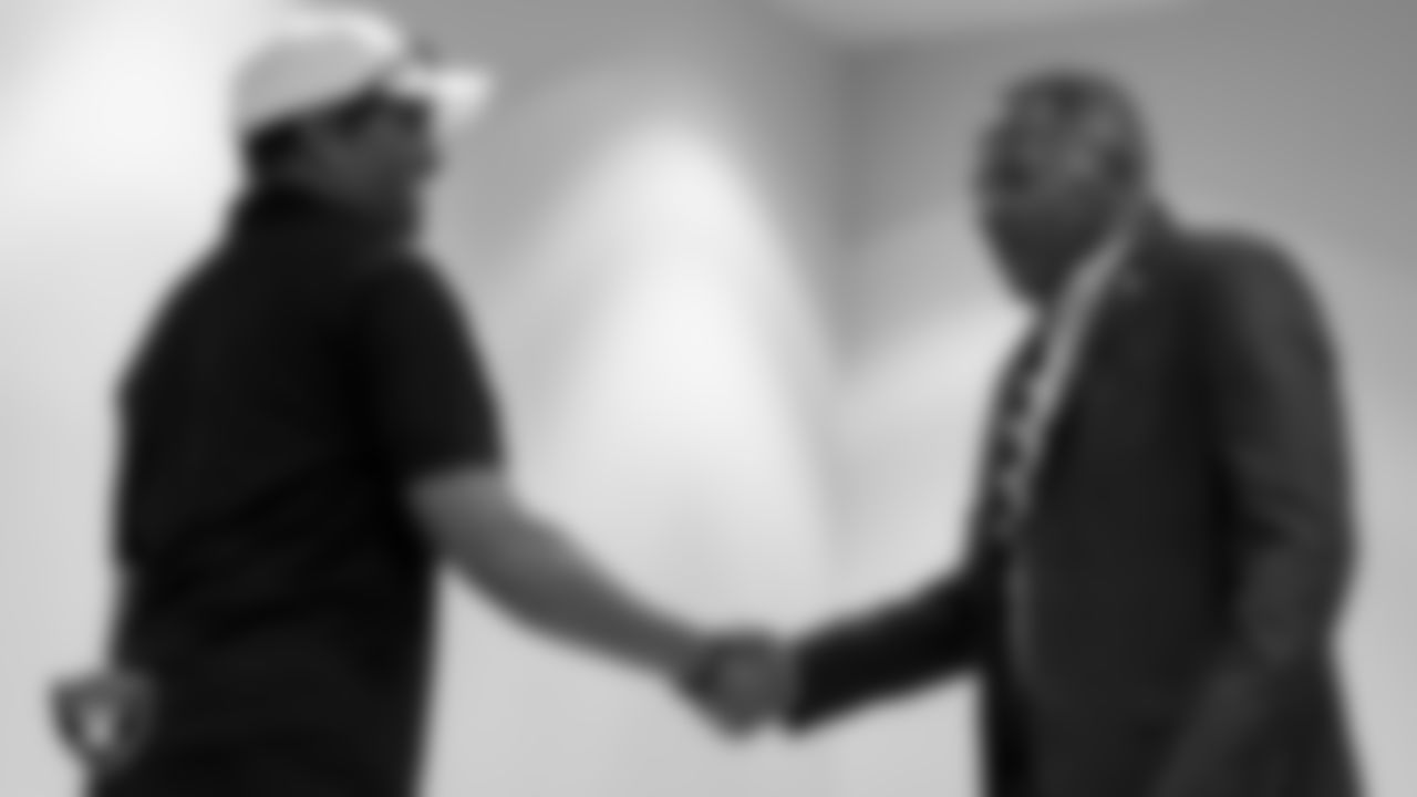 Las Vegas Raiders alumnus Leo Gray and College of Southern Nevada chief of staff Dr. Lawrence Weekly before the Children's Attorneys Project panel at Pearson Community Center.