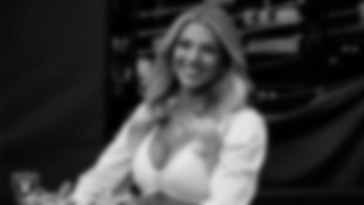 Raiderette Cori walks through the tunnel before the regular season home game against the Kansas City Chiefs at Allegiant Stadium.