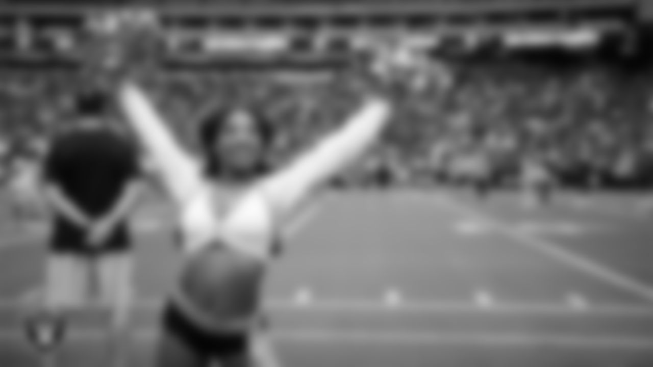 Raiderette Bria on the sidelines during a 2025 Training Camp mock game at Allegiant Stadium.