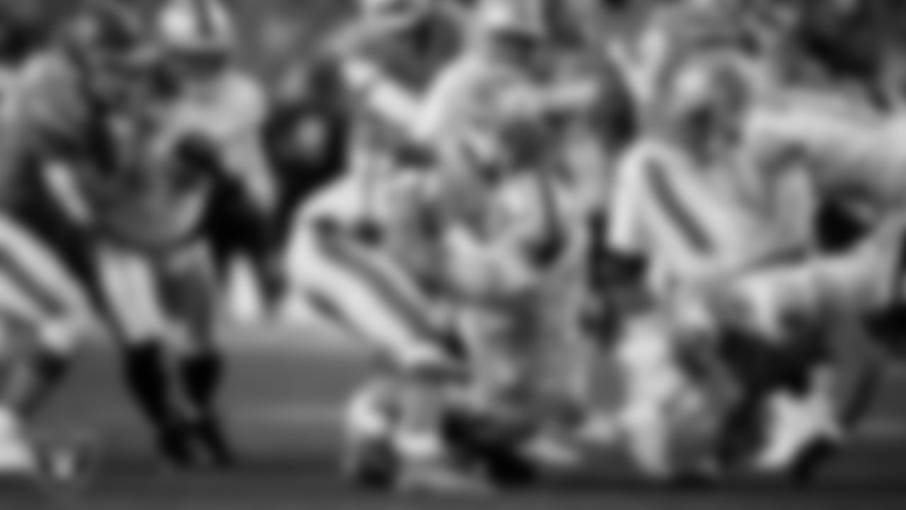 Las Vegas Raiders linebacker Cody Lindenberg (55) makes a tackle during the regular season away game against the Denver Broncos at Empower Field at Mile High.